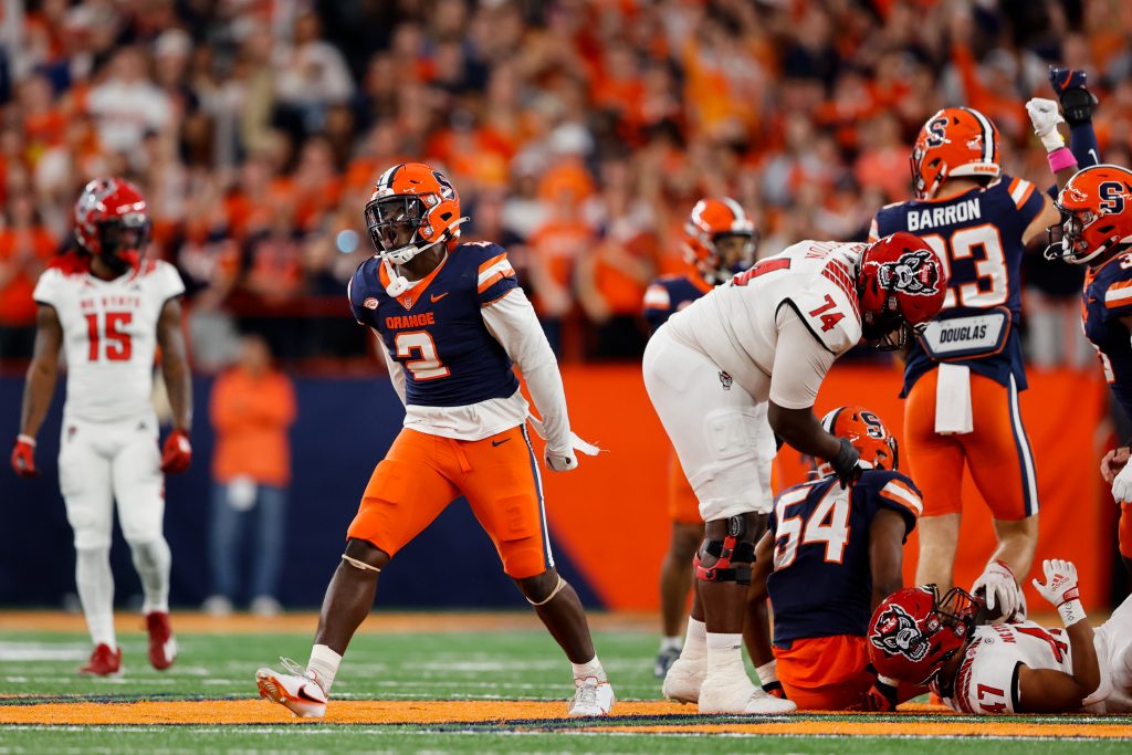 Marlowe Wax #2 of the Syracuse Orange reacts after a play against the North Carolina State Wolfpack