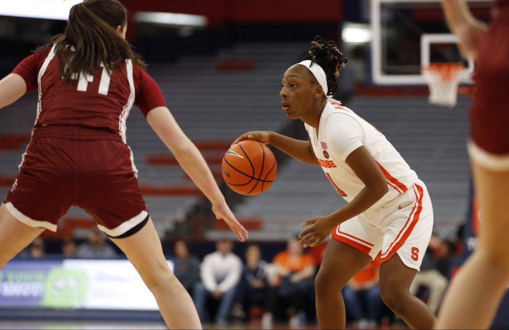 Number 11 Lexi McNabb handles the ball against Colgate number 41 Abbey Ferguson at the Syracuse women's basketball game vs. Colgate on Nov. 10, 2022, at the JMA Wireless Dome
