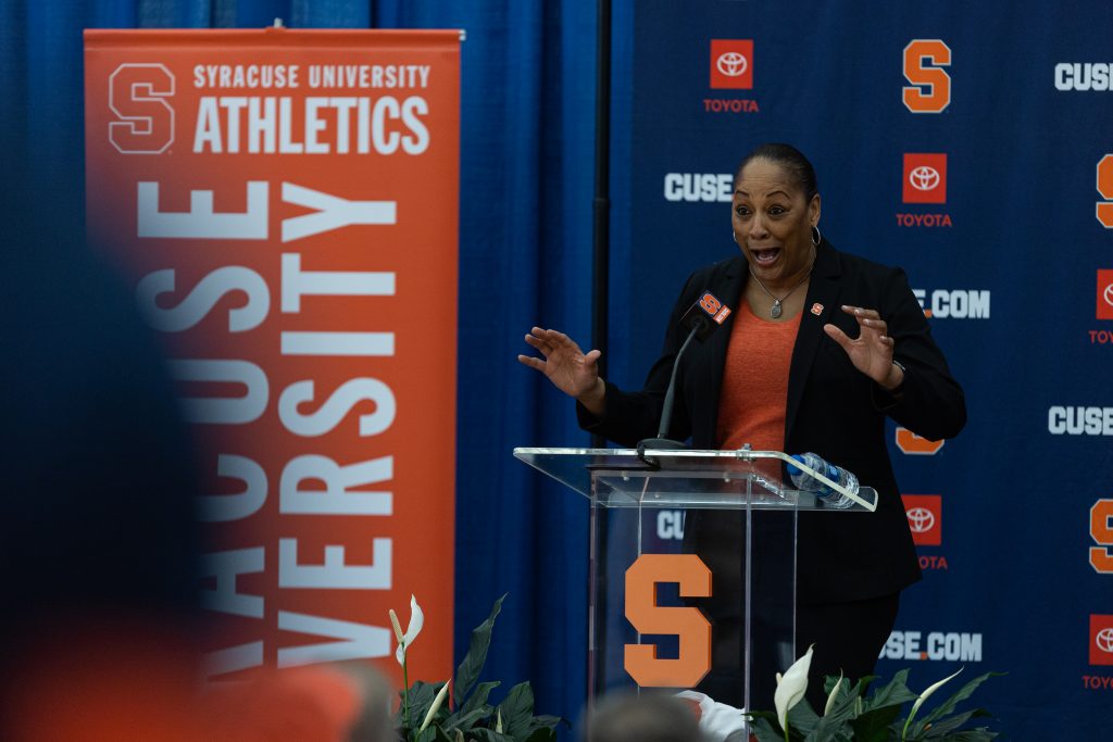 Felisha Legette-Jack stands at the pdium during the official press conference in the Melo Center on March 28th, 2022.
