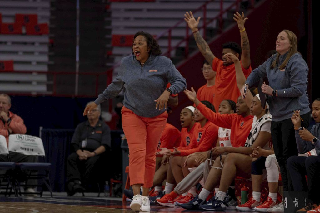 Syracuse coach, Felisha Legette-Jack and Syracuse bench celebrating a foul on LIU.
