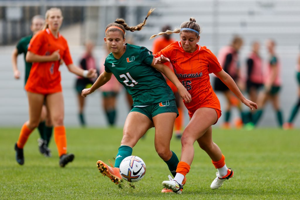 SYRACUSE, NY - SEPTEMBER 25: Koby Commandant #16 of Syracuse Orange battles for the ball against the Miami Hurricanes at SU Soccer Stadium on September 25, 2022 in Syracuse, New York. (Photo by Isaiah Vazquez)