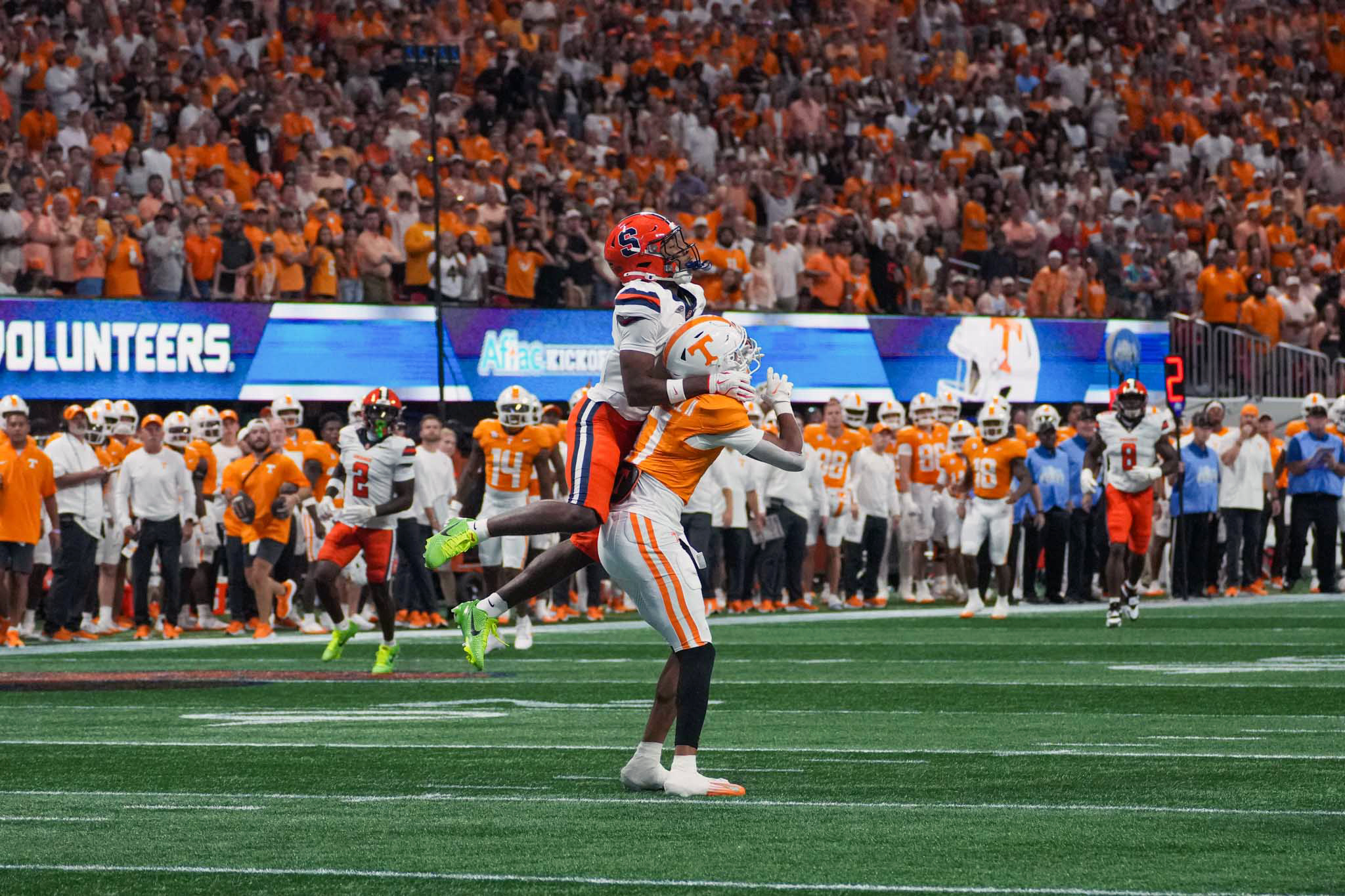 Defensive back Demetres Samuel Jr. (1) pass interferes Tennessee as Syracuse faced
Tennessee on Saturday, August 30, 2025, for the Aflac Kickoff Game at Mercedes-Benz Stadium in Atlanta.
