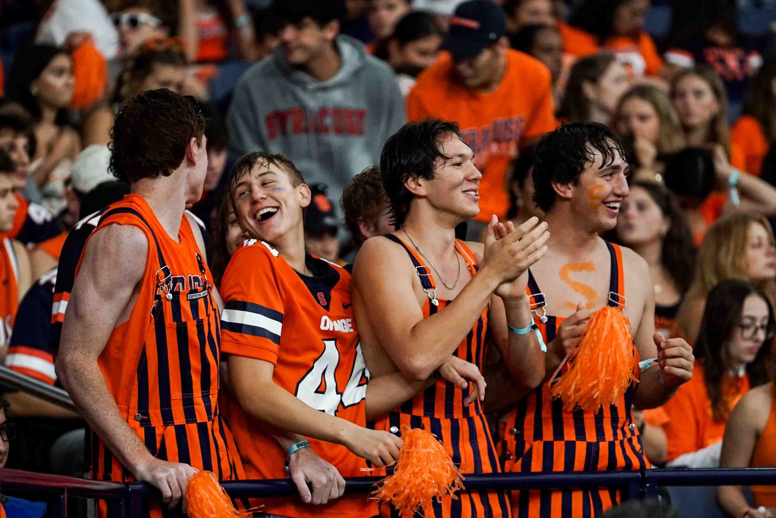 Syracuse fans celebrate as they enter the JMA Wireless Dome for their home opener against UCONN on Saturday.