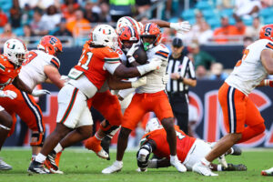 Yasin Willis #6 of the Syracuse Orange carries the ball against the Miami Hurricanes during the second quarter of the game at Hard Rock Stadium on November 08, 2025 in Miami Gardens, Florida.
