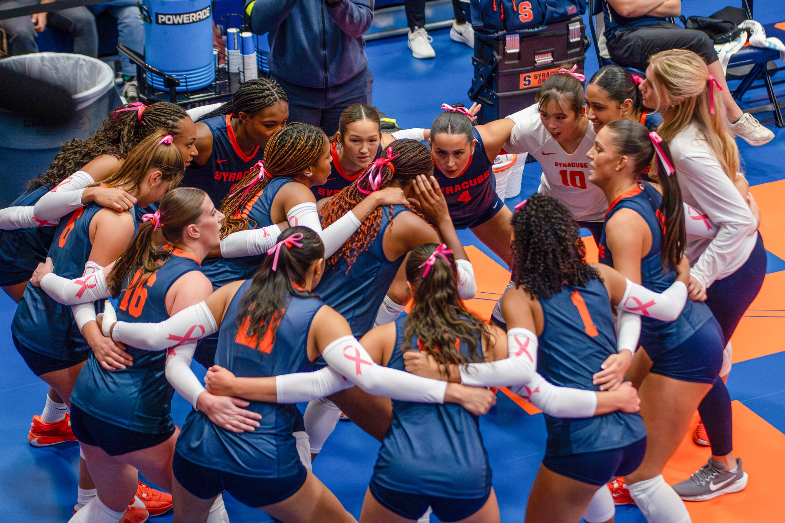 Syracuse Women's Volleyball prepares for their match against California on Friday, October 10, at the Women's Building.