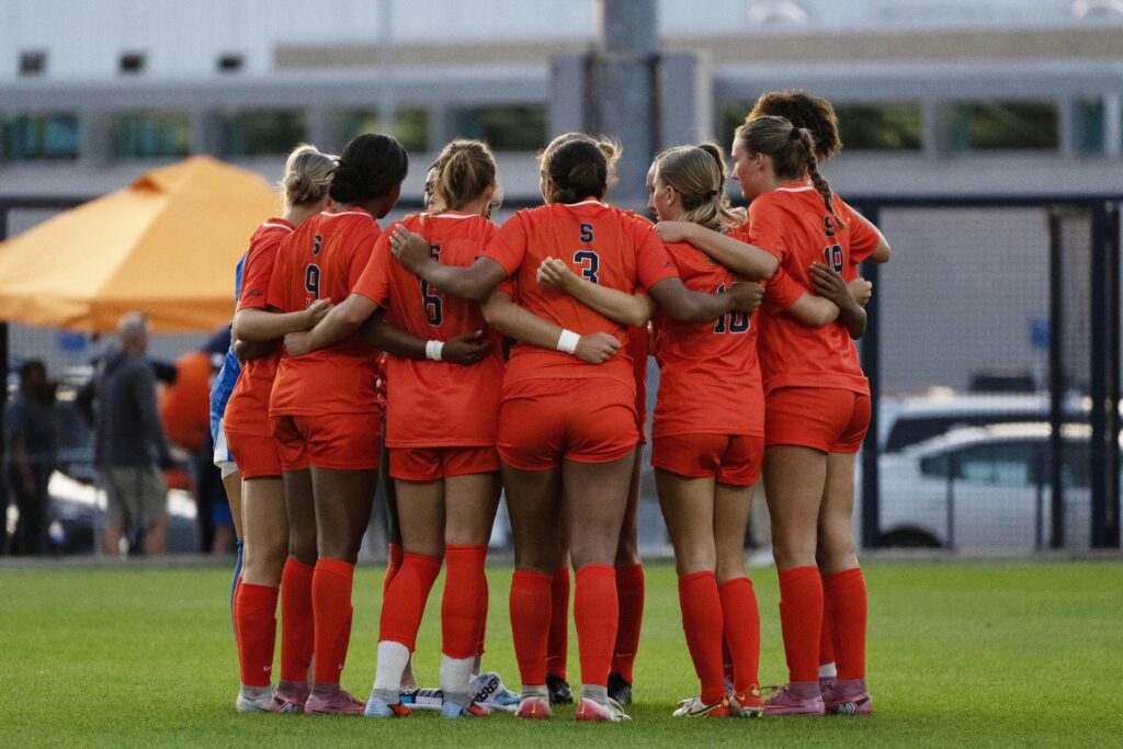 Syracuse team huddle before facing SMU on 9/11/25