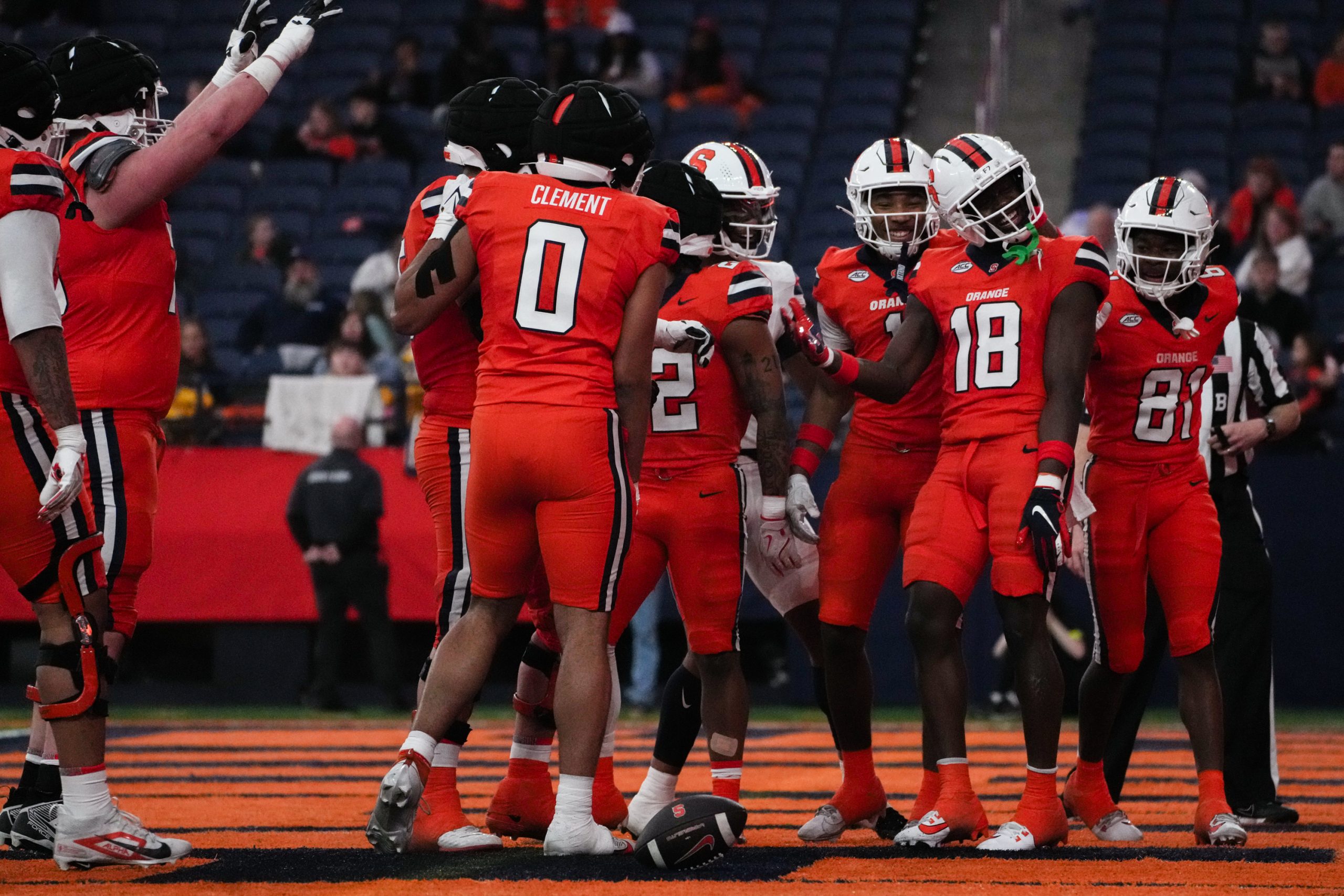 Wide reciever Emanuel Ross celebrates with his teammates after a touchdown catch during the Spring Football game at the JMA Wireless Dome on Saturday. (Photo by Jack Henry / Newhouse School)