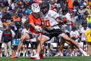 Maryland's AJ Larkin scored both of this shots on goals to help the Terps defeat Syracuse 14-8 on Saturday during the NCAA Men's Lacrosse Championships Semifinals in Foxborough, Mass.