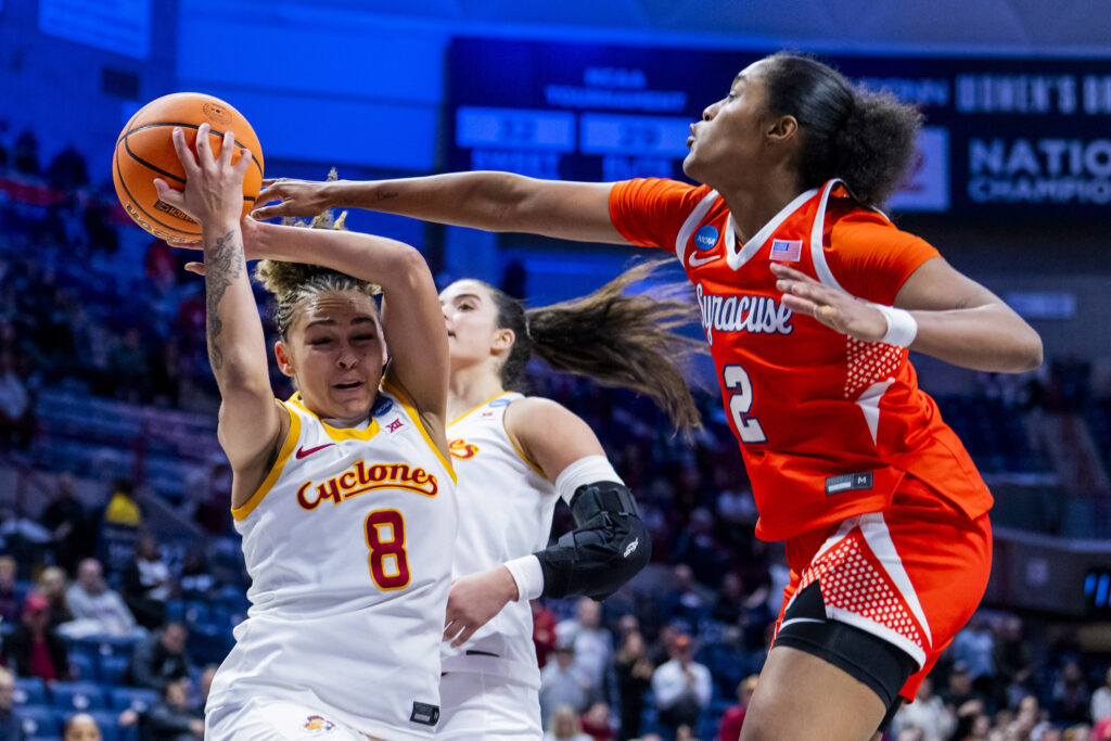 Jada Williams #8 of the Iowa State Cyclones is defended by Journey Thompson #2 of the Syracuse Orange during the second half in the first round of the 2026 NCAA Women's Basketball Tournament at Harry A. Gampel Pavilion on March 21, 2026 in Storrs, Connecticut.
