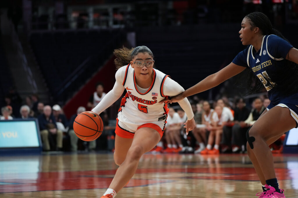 Syracuse #5 Laila Phelia dribbles to the net in Syracuse's game against Georgia Tech.