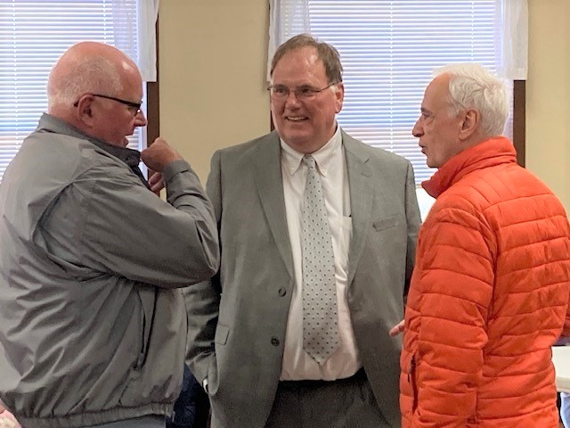 Onondaga County Legislator Bill Kinne, center, chats with supporters at the Valley American Legion May 17, 2023.