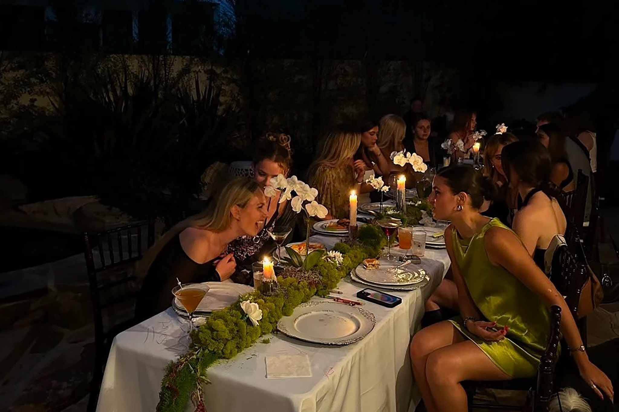 Best friends gathering for dinner together as is typical of Galentine's Day.