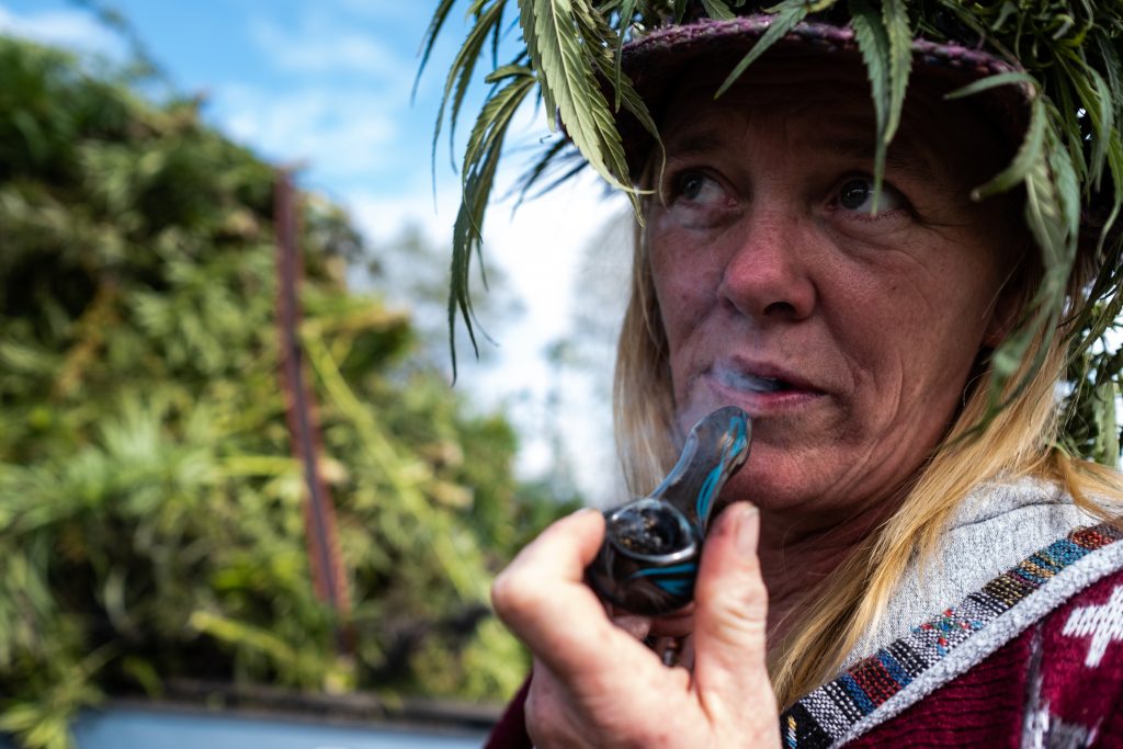 Buffy smokes a bowl following the harvest.