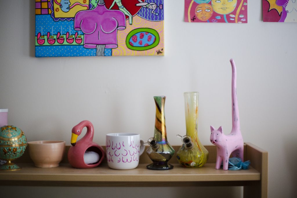 Somewhere Bina feels most relaxed is her bedroom, which is covered in art by Shai Hendrix, one of her favorite artists. Bina describes it as a place that gives her “energy and happiness”, which are especially helpful on more stressful days.