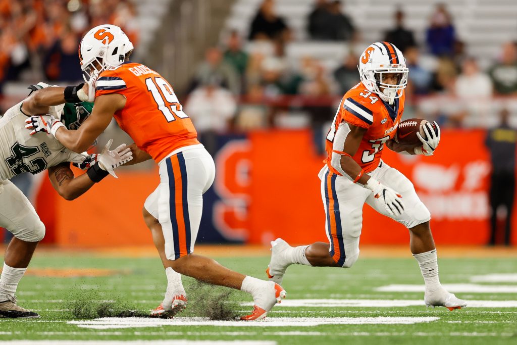 SYRACUSE, NY - OCTOBER 1: Sean Tucker #34 of Syracuse Orange finds a hole against the Wagner Seahawks at JMA Wireless Dome on October 1, 2022 in Syracuse, New York. (Photo by Isaiah Vazquez)