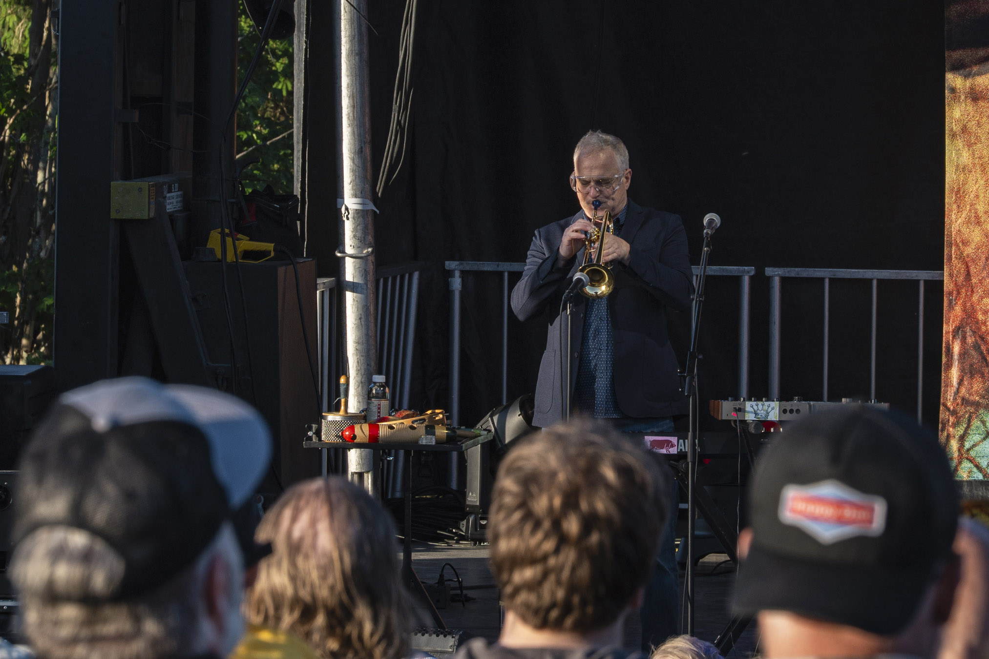 Longtime CAKE trumpet player Vince DiFiore performs during the band's sold-out concert at Beak & Skiff Apple Orchards on May 30, 2026. DiFiore, a founding member of the Sacramento-based alternative rock band, has been a fixture of CAKE's signature sound for more than three decades.