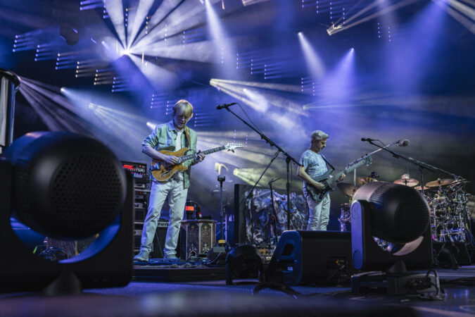 Phish performs beneath a lattice of white and blue light at Empower Federal Credit Union Amphitheater at Lakeview in Syracuse, N.Y., on Tuesday, July 21, 2026. The concert marked the band’s third appearance at the venue. Photo by Matt Hofmann