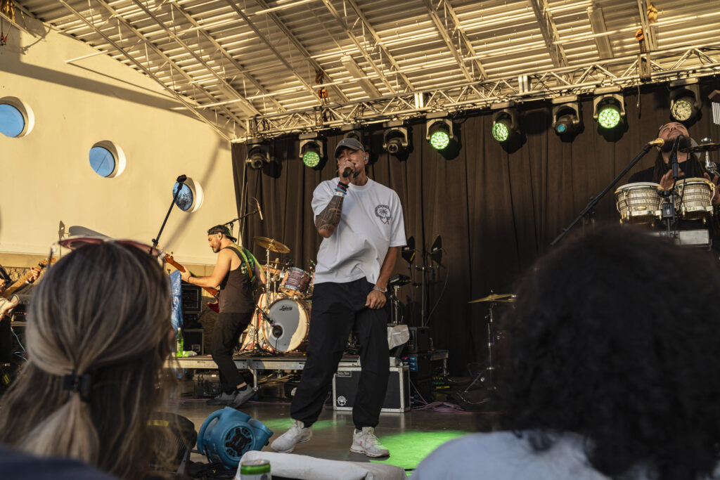 Justin Kawika Young of Seven Suns performs at Paper Mill Island in Baldwinsville on Friday, Aug. 14, 2026. Young, a longtime fixture in Hawai‘i’s music scene, brings years of experience as a singer-songwriter and performer to the Honolulu-based group. Photo by Matt Hofmann.