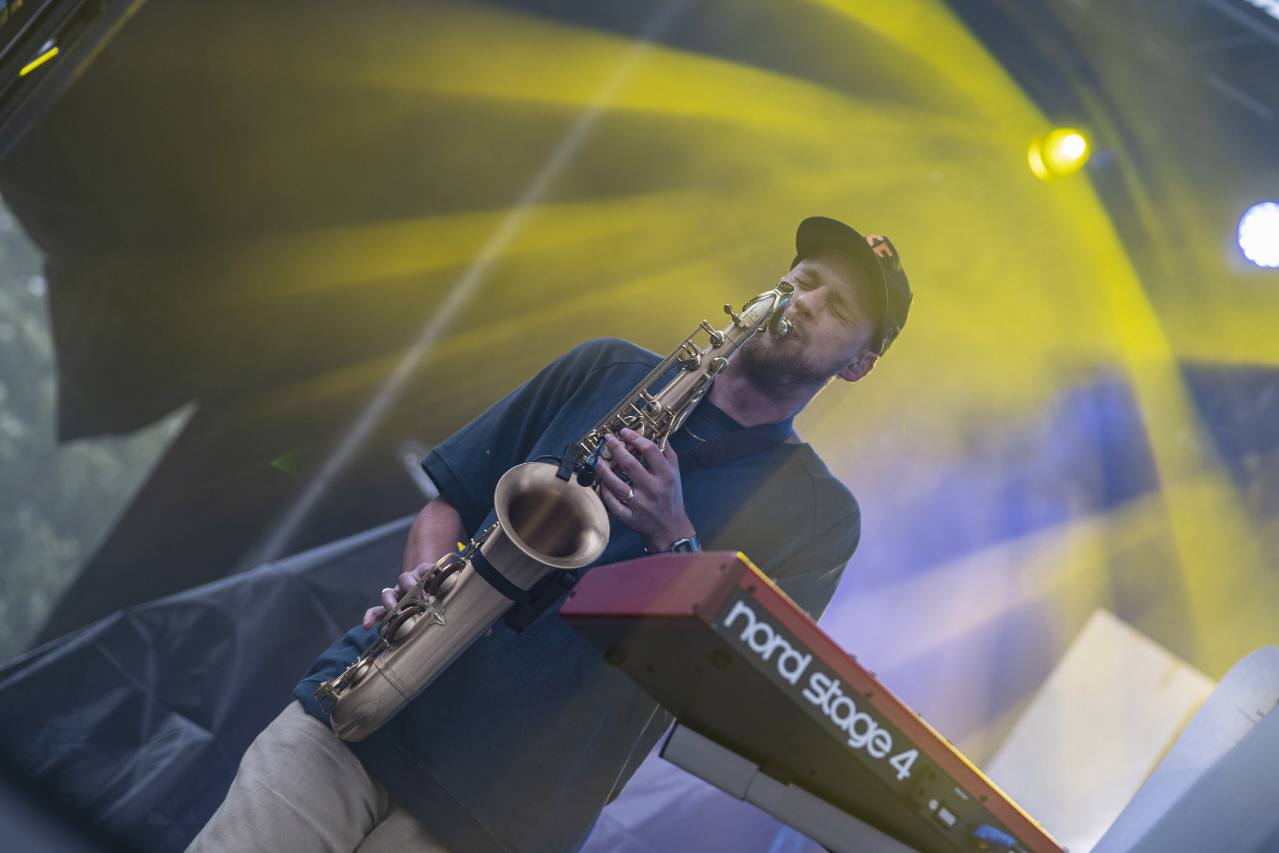 A saxophone solo adds another layer to DENM’s reggae-influenced set at Beak & Skiff Apple Orchards on Sunday. DENM performed between Bumpin Uglies and headliner Slightly Stoopid. Photo by Matt Hofmann.