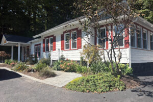 The Clerk’s House’s traditional home exterior reflects its 100-year history.