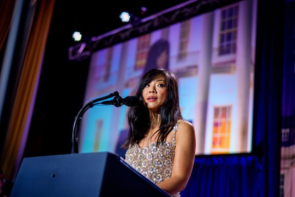 White House Correspondents Association President and CBS Senior White House Correspondent Weijia Jiang comes back to the stage to speak after a shooting incident at the annual White House Correspondents Association Dinner April 25, 2026 in Washington, DC. According to reports, President Donald Trump, along with other government officials, were evacuated from the Washington Hilton after what sounded like gun fire.